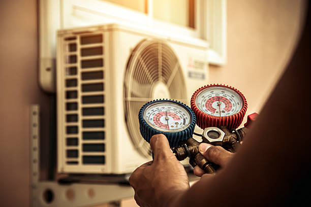 Professional Heat Pump Repair technician working in Loxley, AL